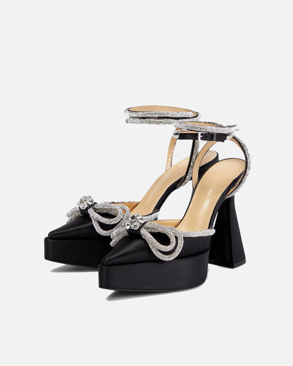 Rina Crystal Bow Platform Flared Heels In Black
