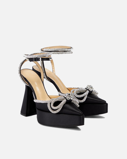 Rina Crystal Bow Platform Flared Heels In Black