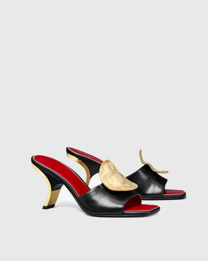 Sabra Metal Coin Asymmetrical Slippers In Black