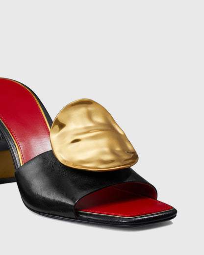 Sabra Metal Coin Asymmetrical Slippers In Black