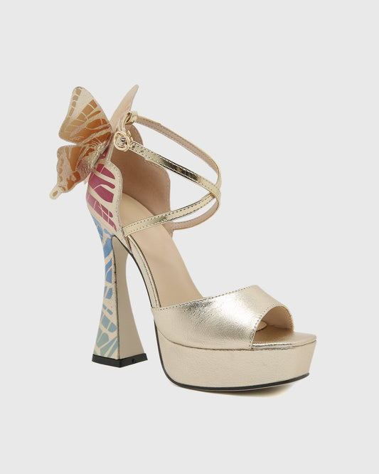 Rossa Wing Cross Strap Platform Flared Heels In Gold