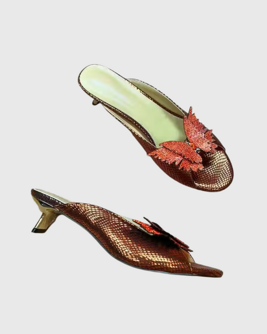 Siria Glitter Butterfly Mules In Orange