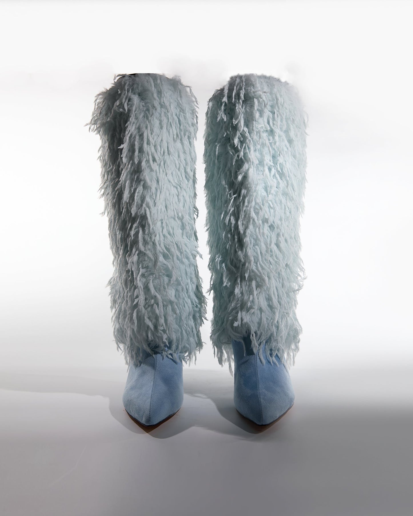 Vinceta Feather Knee High Boots In Baby Blue