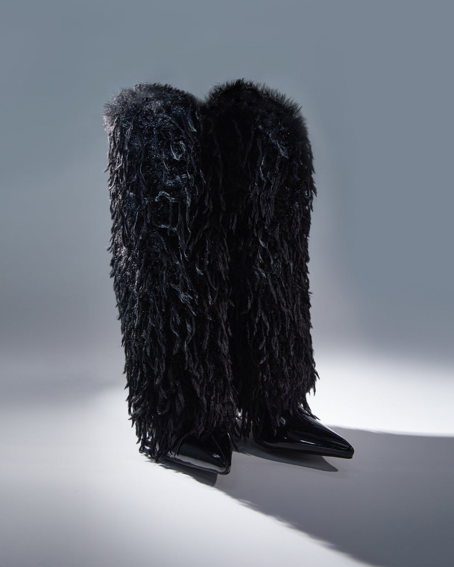Vinceta Feather Knee High Boots In Black