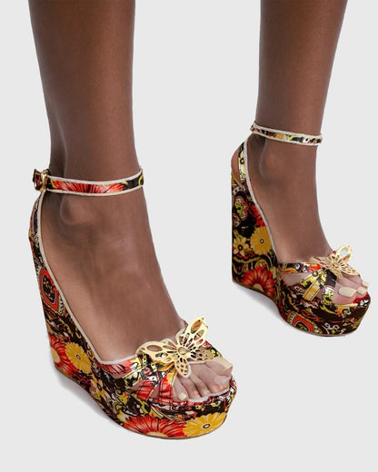 Xannon Metal Butterfly Floral Print Wedge Sandals