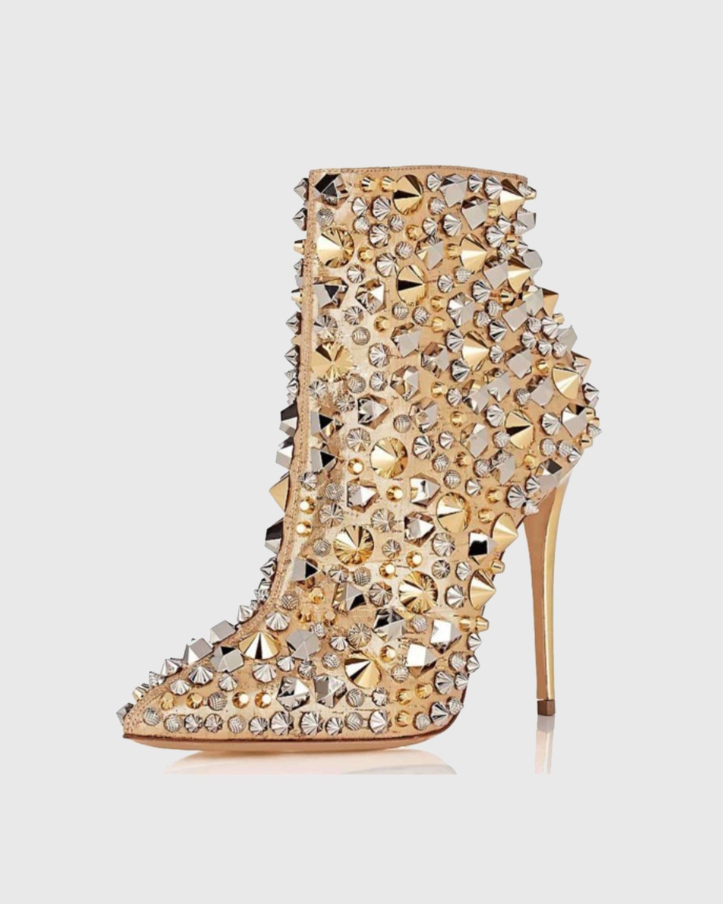 Xiola Rivet Embellished Ankle Boots In Gold
