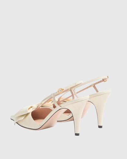 Zaina Bow Slingback Pumps In Cream