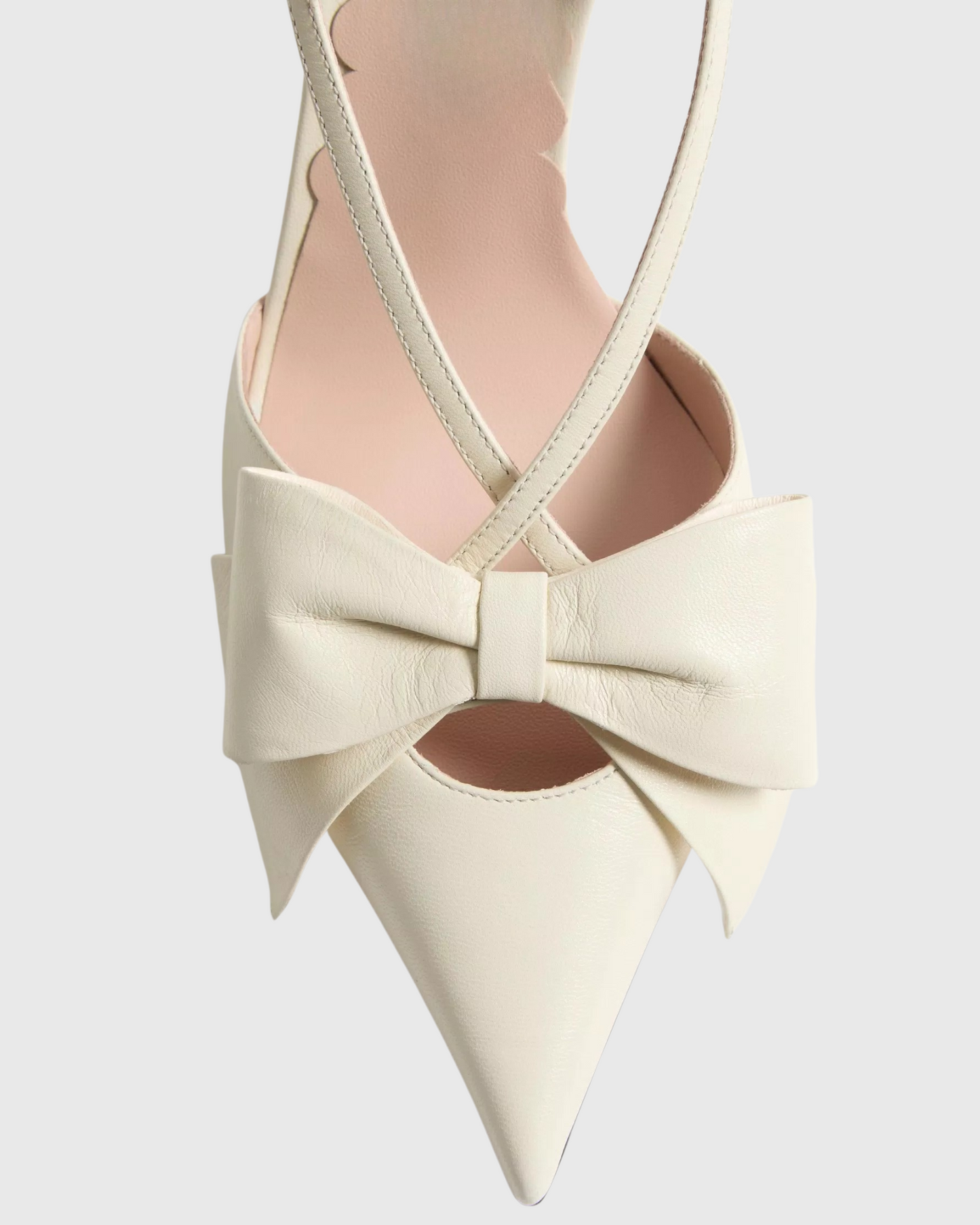Zaina Bow Slingback Pumps In Cream