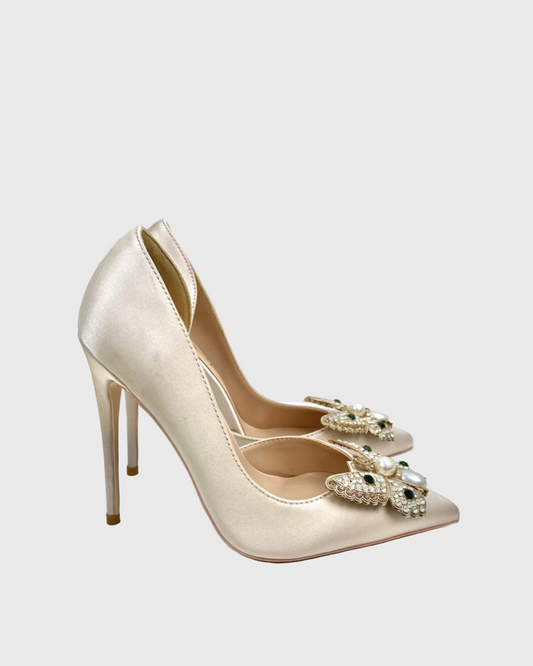 Zareen Butterfly Side Cut  Pumps In Champagne
