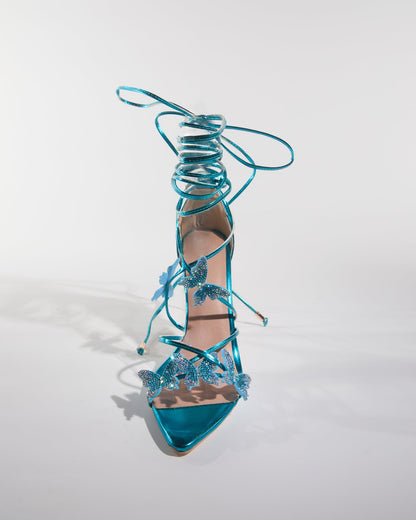 Zarita Crystal Butterfly Lace Up Sandals In Blue