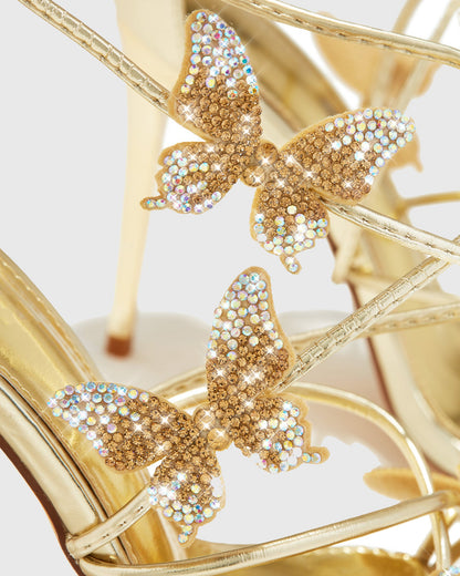 Zarita Crystal Butterfly Lace Up Sandals In Gold