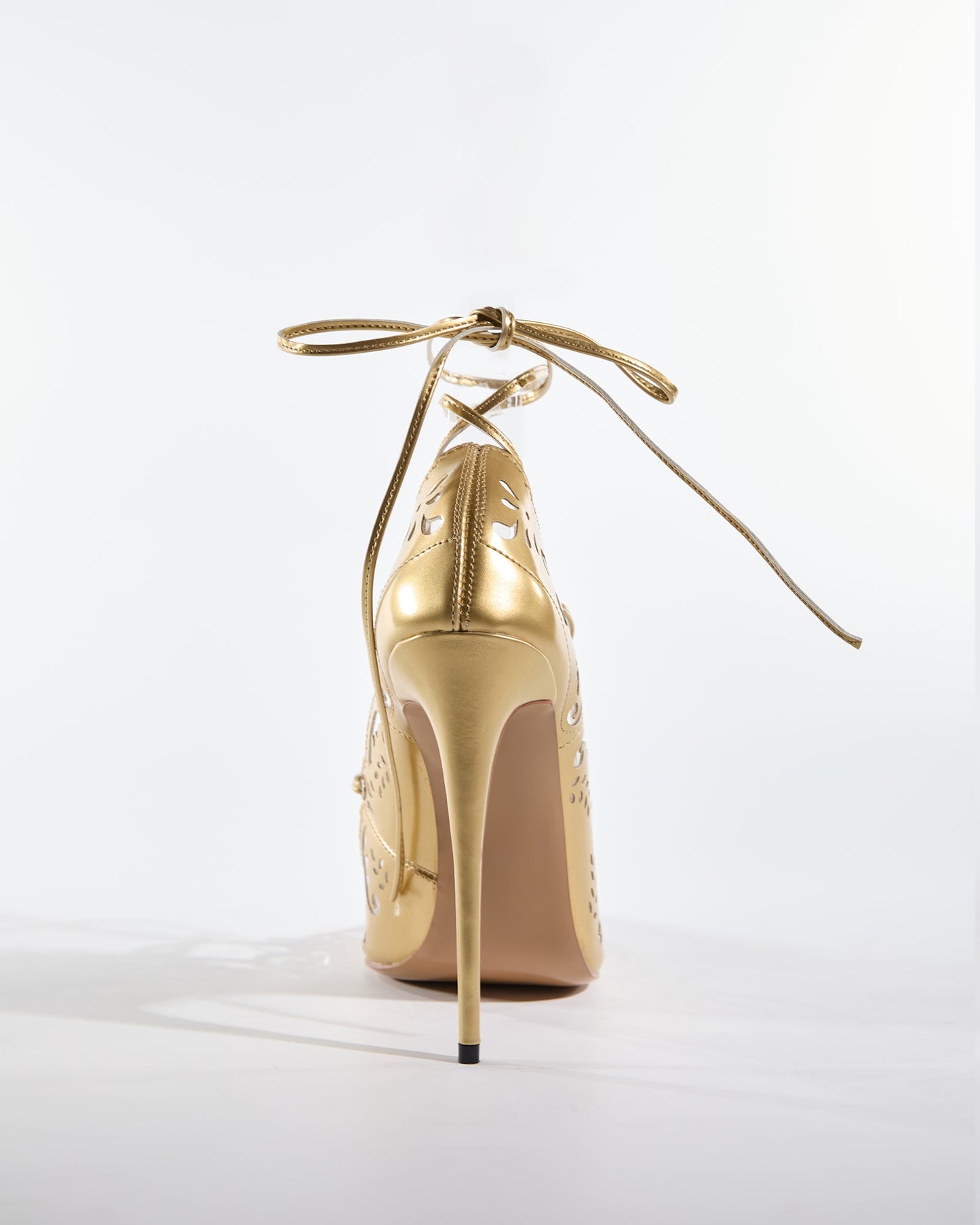 Ariya Cutout Pattern Lace Up Pumps In Gold