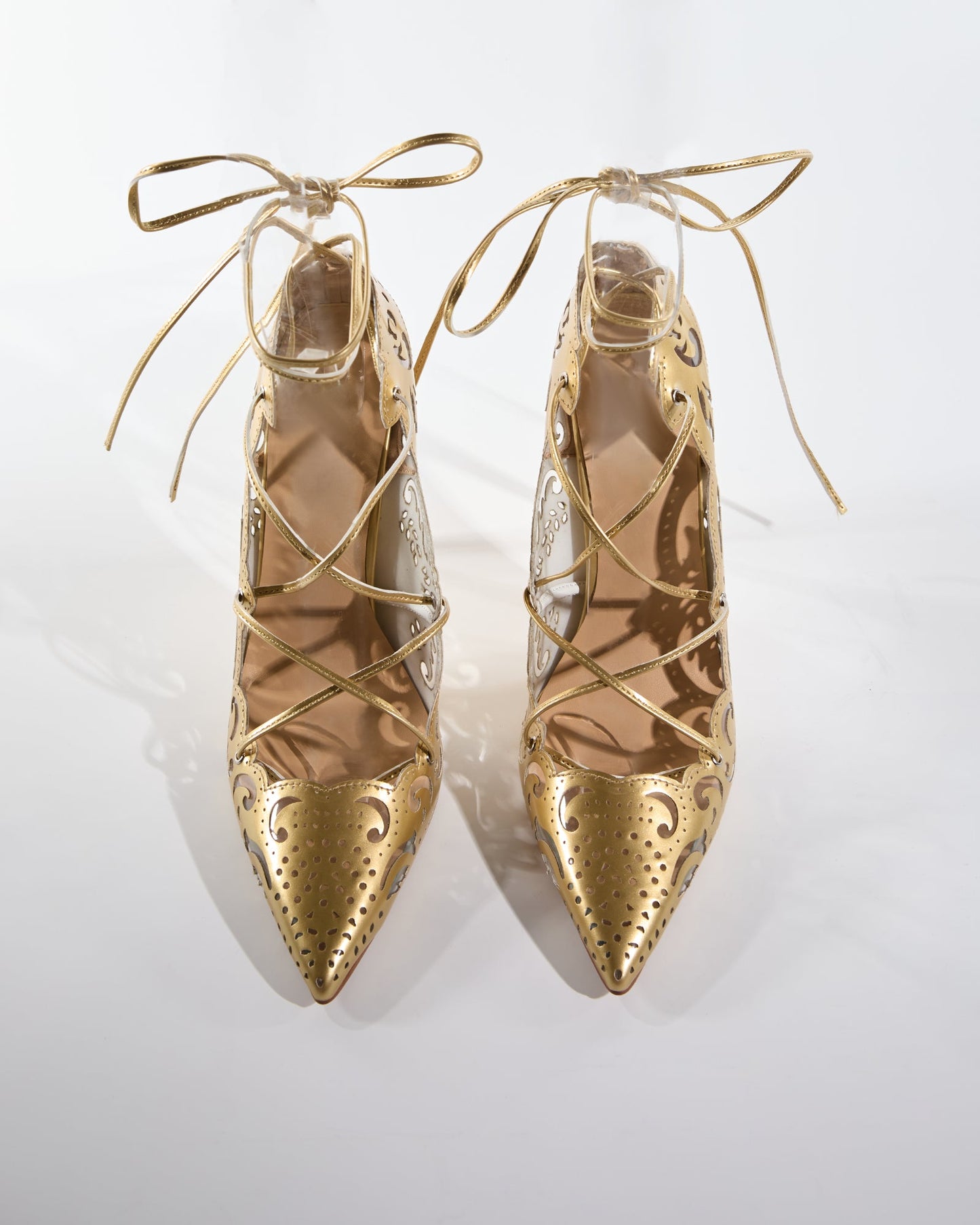 Ariya Cutout Pattern Lace Up Pumps In Gold