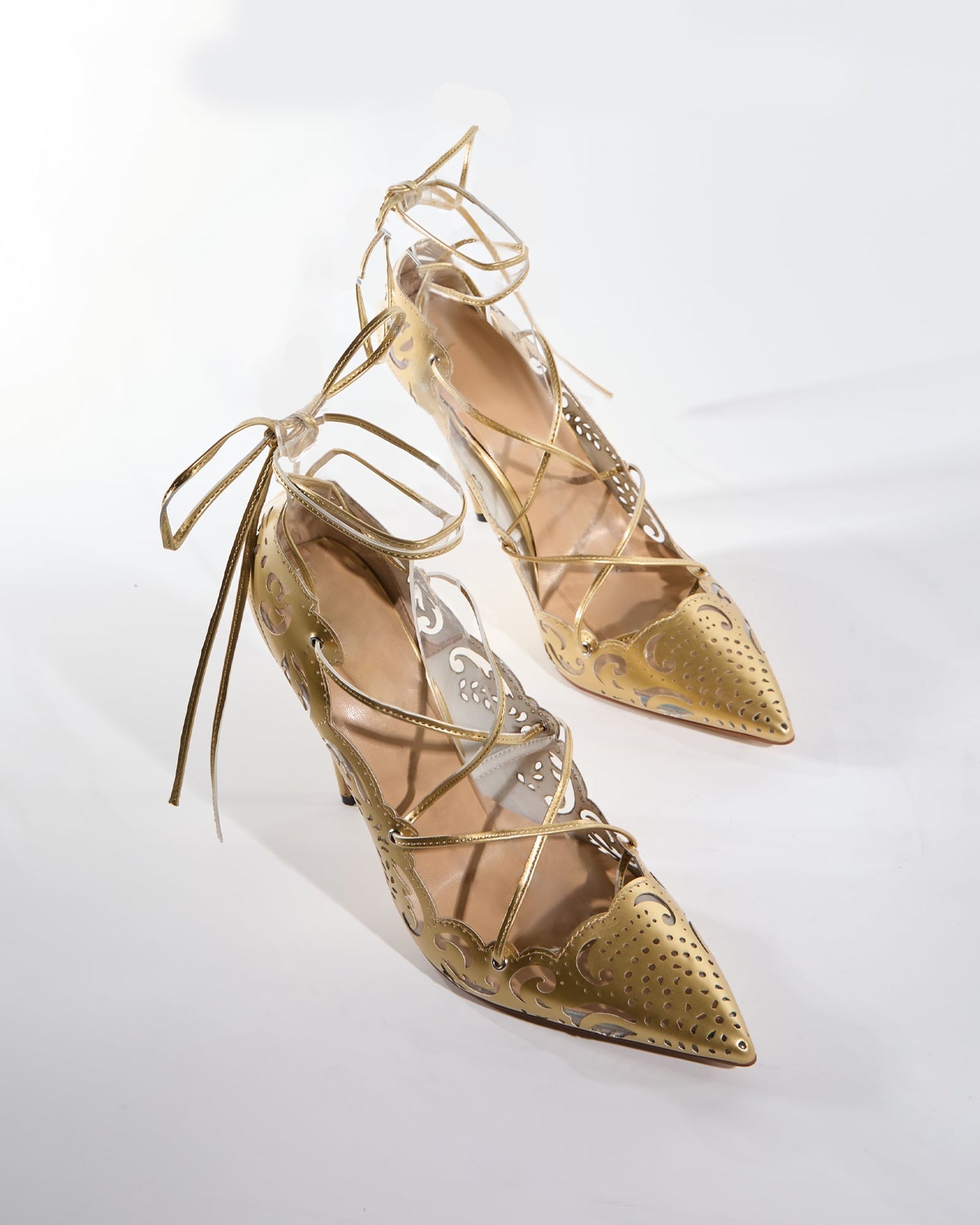 Ariya Cutout Pattern Lace Up Pumps In Gold
