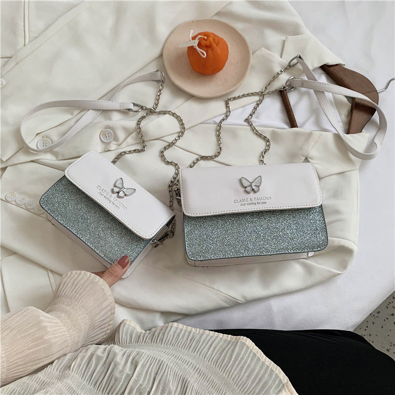 Sac à bandoulière en PU à rabat décoratif et papillon pour femme 