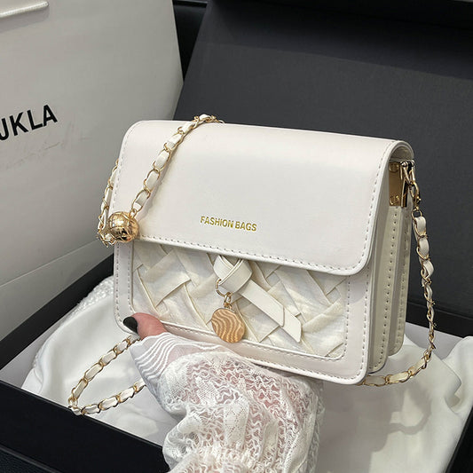 Sac à bandoulière carré au design tendance 