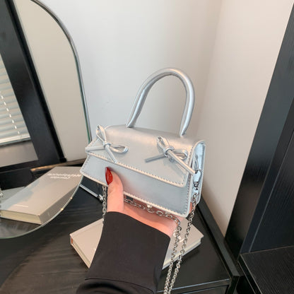 Mini sac bandoulière tendance à chaîne et nœud de couleur unie 