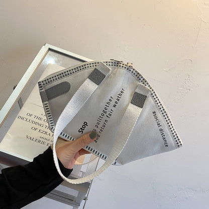 Sac à bandoulière en toile de grande capacité pour femme, motif de lettres, créatif et amusant, en forme de masque 