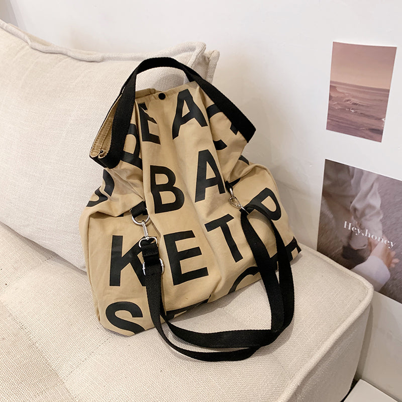 Sac à bandoulière en toile grande capacité pour femme, style décontracté, motif lettres 