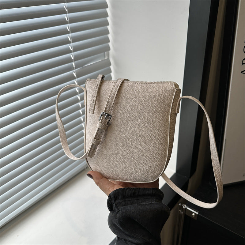 Sac à bandoulière en PU de couleur unie pour femme 