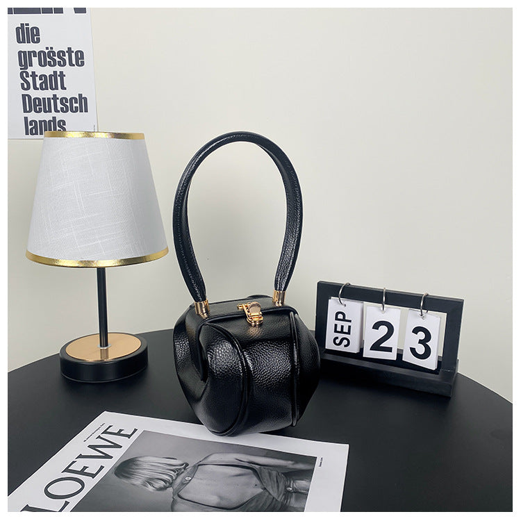 Sac à main tendance et créatif de couleur unie 