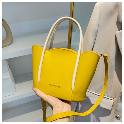 Women Fashion Solid Color Wavy Edge PU Handle Shoulder Bag