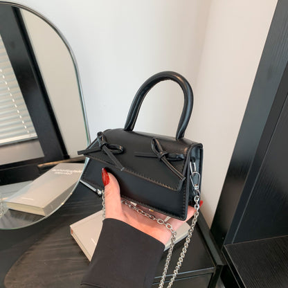 Mini sac bandoulière tendance à chaîne et nœud de couleur unie 
