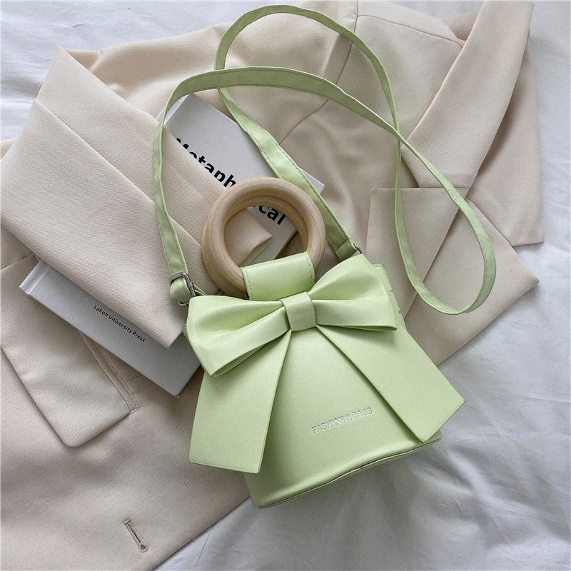 Sac à bandoulière en PU avec nœud de couleur unie pour femme 