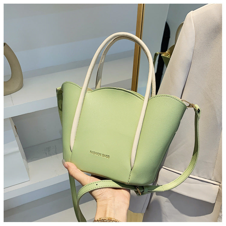 Women Fashion Solid Color Wavy Edge PU Handle Shoulder Bag