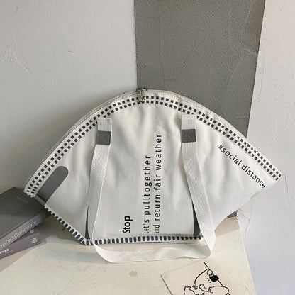 Sac à bandoulière en toile de grande capacité pour femme, motif de lettres, créatif et amusant, en forme de masque 
