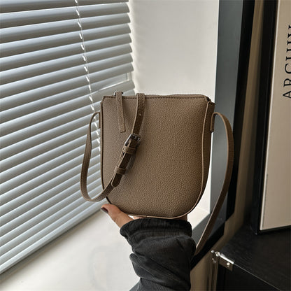 Sac à bandoulière en PU de couleur unie pour femme 