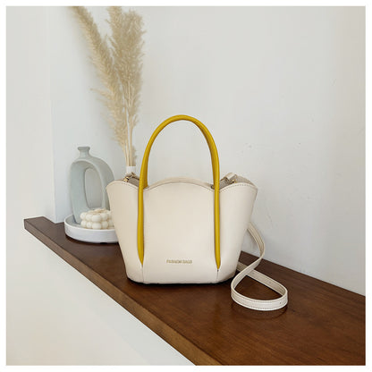 Women Fashion Solid Color Wavy Edge PU Handle Shoulder Bag