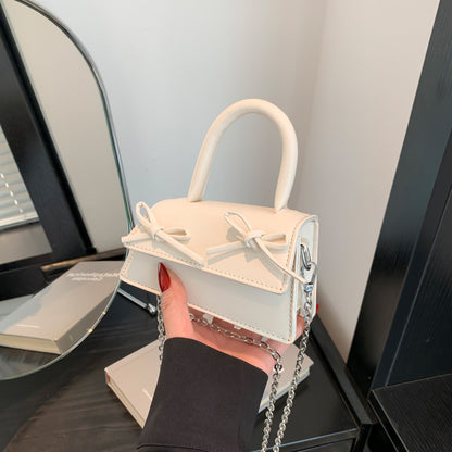 Mini sac bandoulière tendance à chaîne et nœud de couleur unie 
