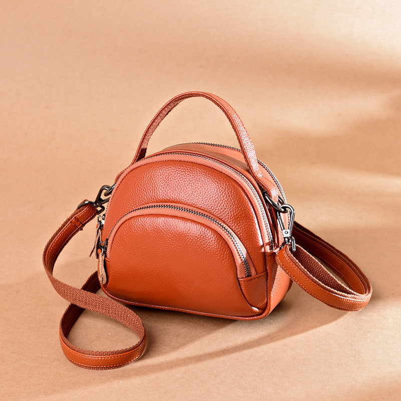 Sac à bandoulière décontracté en cuir véritable pour femme, couleur unie, avec fermeture éclair 