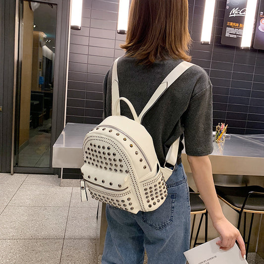 Women Fashion Rivets Soft Leather Solid Color Backpack
