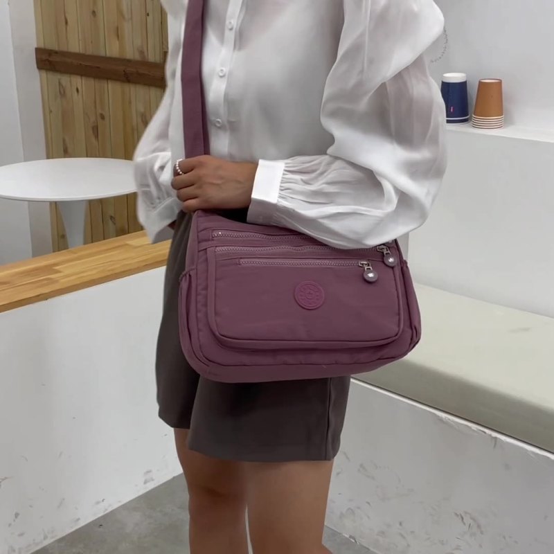 Sac à bandoulière décontracté à poches multiples pour femme, fermeture éclair, couleur unie, grande capacité 