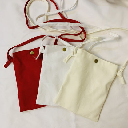 Sac à bandoulière simple en toile de couleur unie pour femme 