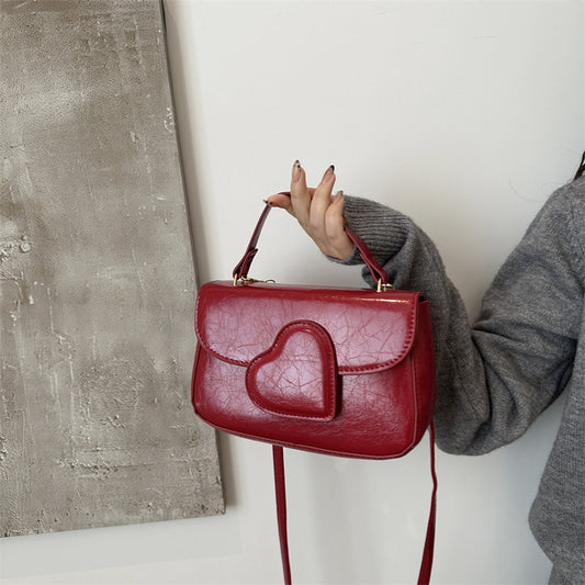 Sac à bandoulière tendance en forme de cœur de couleur unie 