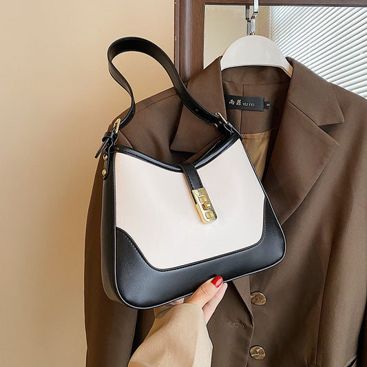 Sac à main tendance en cuir synthétique avec fermeture en métal et blocs de couleurs pour femme 