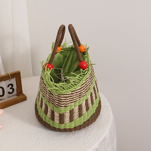 Joli sac à main en paille tressée avec perles en bois multicolores 