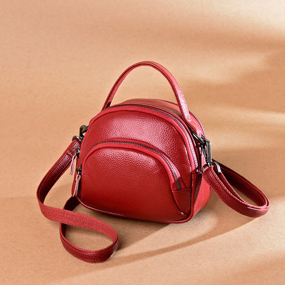 Sac à bandoulière décontracté en cuir véritable pour femme, couleur unie, avec fermeture éclair 