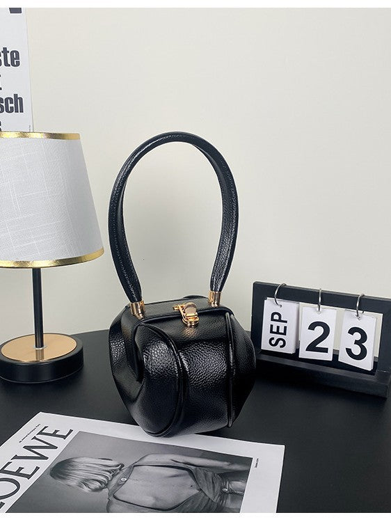 Sac à main tendance et créatif de couleur unie 