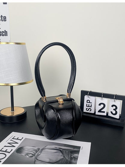 Sac à main tendance et créatif de couleur unie 