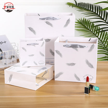 Sac en papier imprimé plumes tendance 