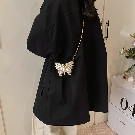 Mini sac bandoulière en métal à strass et motif papillon 