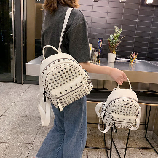 Women Fashion Rivets Soft Leather Solid Color Backpack