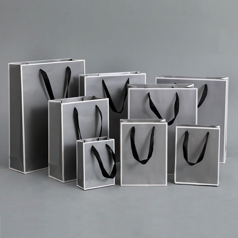 Sac d'emballage en papier gris argenté, simple et portable 