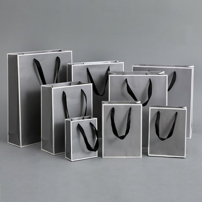 Sac d'emballage en papier gris argenté, simple et portable 