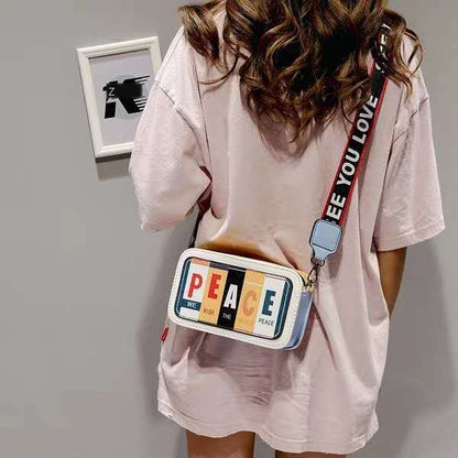 Sac à bandoulière en PU à motif de lettres tendance pour femme, fermeture éclair, blocage des couleurs 