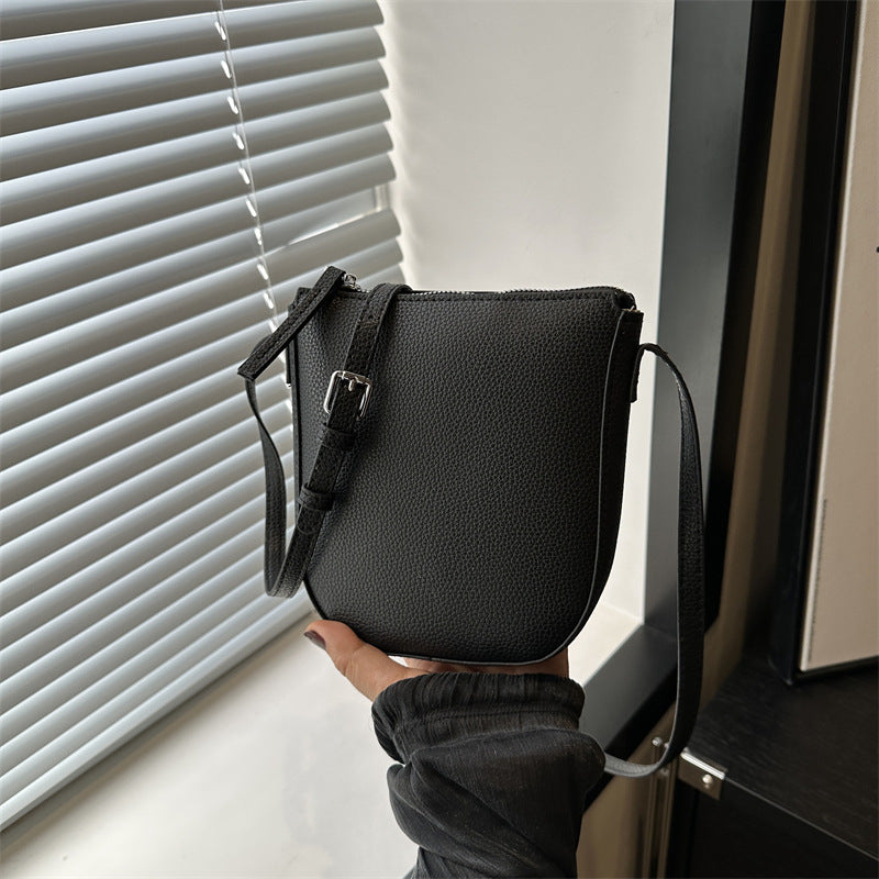 Sac à bandoulière en PU de couleur unie pour femme 